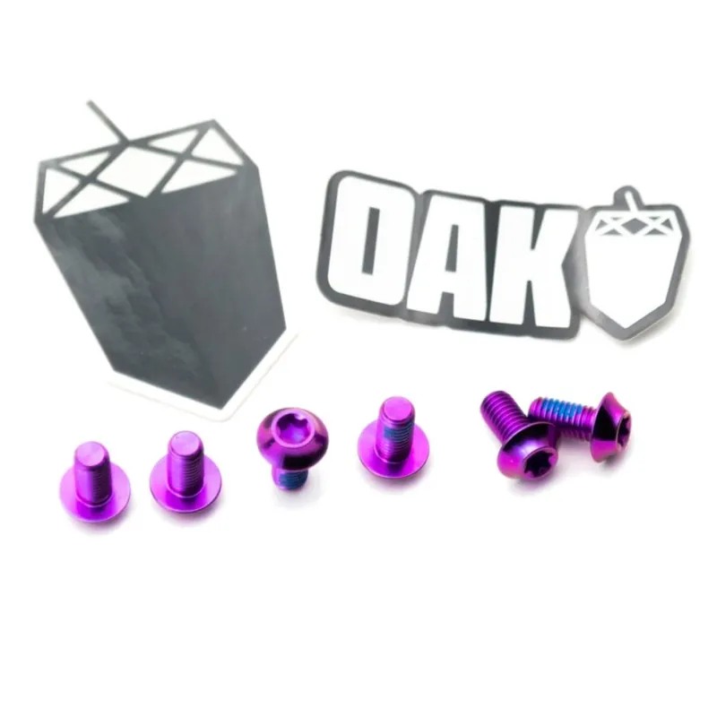 OAK Components Schrauben-Set Bremsscheibe - Titan M5x10 6 Stück - lila Neue Kollektion